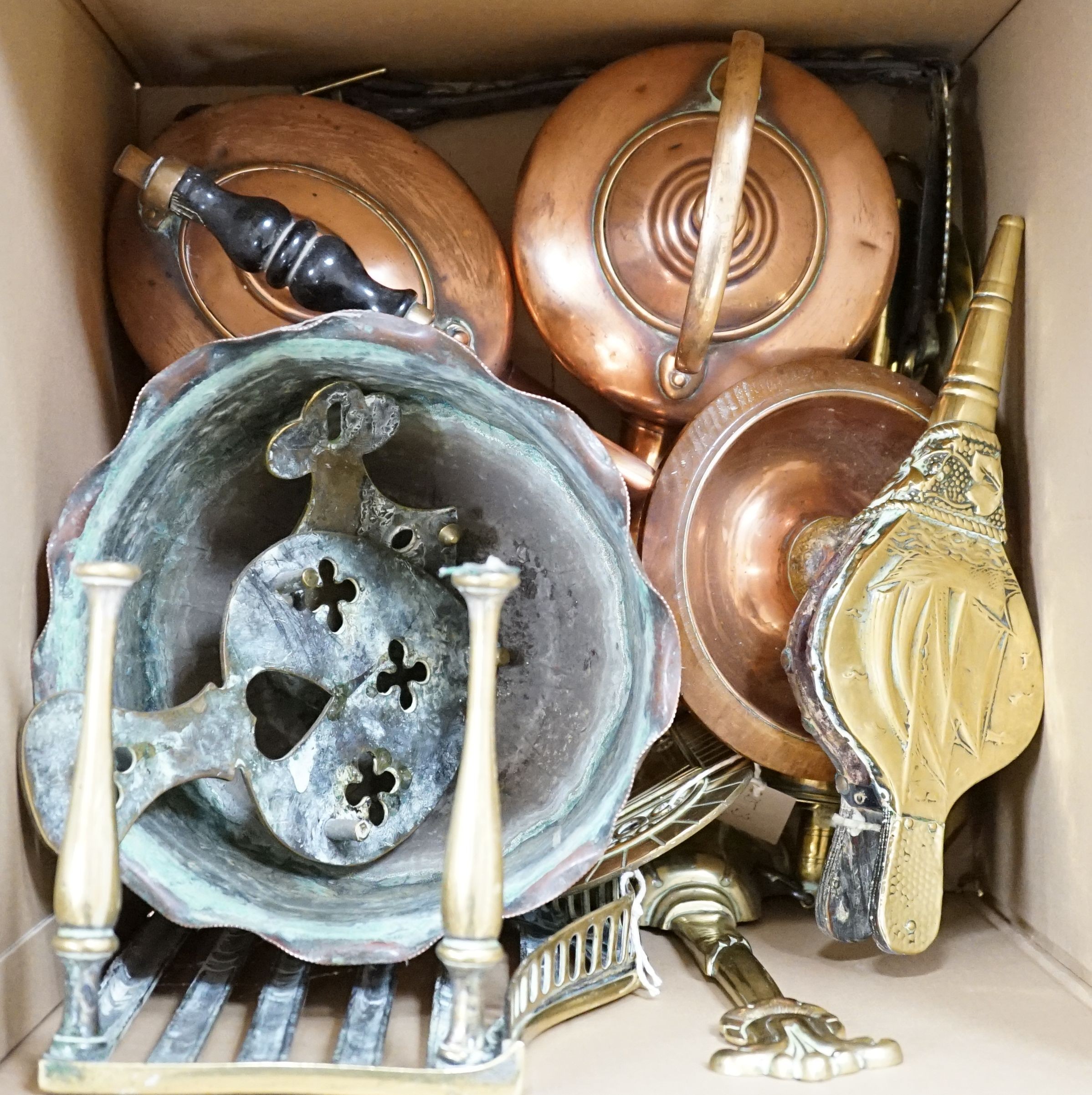 A collection of antique brass and copper items to include kettle, horse brasses, miniature door way, bottle-jack etc